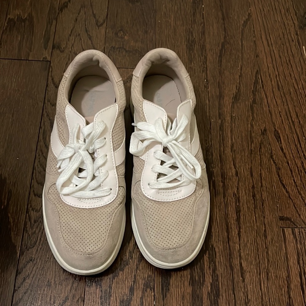 Brown and white sneakers